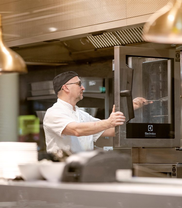 Chef opening Electrolux Professional SkyLine Combi Oven